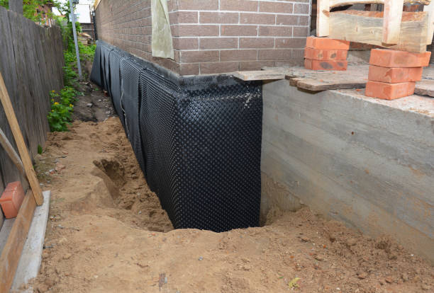 SJ Waterproofing Pros technician performing targeted Emergency Waterproofing assessment in Lovejoy, GA